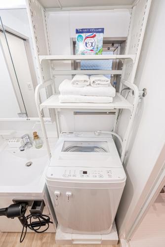 self-check in misimaya building