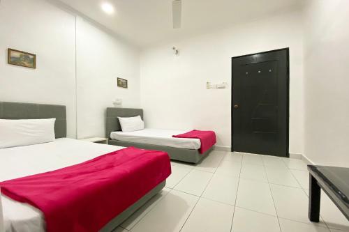 Ένα ή περισσότερα κρεβάτια σε δωμάτιο στο Hotel O Dh Residence