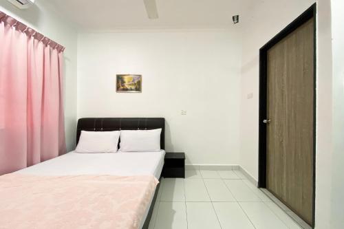 Ένα ή περισσότερα κρεβάτια σε δωμάτιο στο Hotel O Dh Residence
