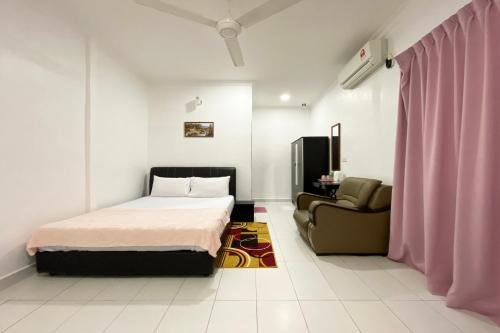 Ένα ή περισσότερα κρεβάτια σε δωμάτιο στο Hotel O Dh Residence