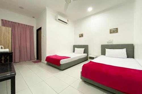 Ένα ή περισσότερα κρεβάτια σε δωμάτιο στο Hotel O Dh Residence