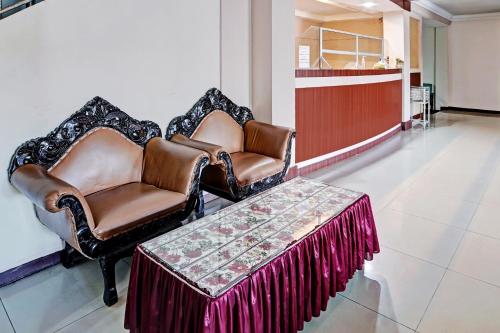 Гостиная зона в Hotel O Wisma Kuta Karang Baru