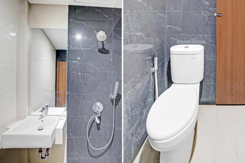 Ванная комната в Hotel O Wisma Kuta Karang Baru