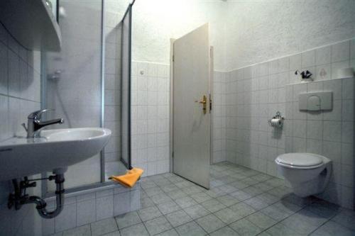 Koupelna v ubytování Kartoffelgasthaus & Pension Knidle