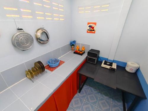 Φωτογραφία από το άλμπουμ του Apartment Room with Full Kitchen σε San Pa Tong