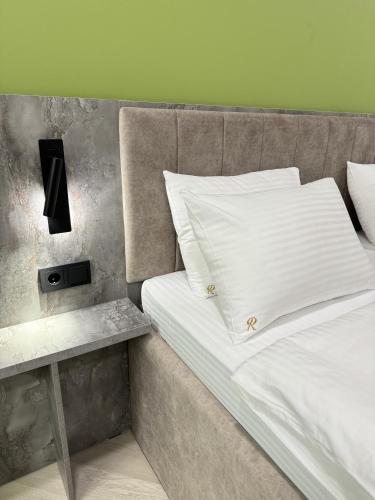 Postel nebo postele na pokoji v ubytování Residence Hotel