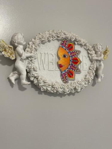 a plate with two children on it with a sign at nuitzen in Boyer