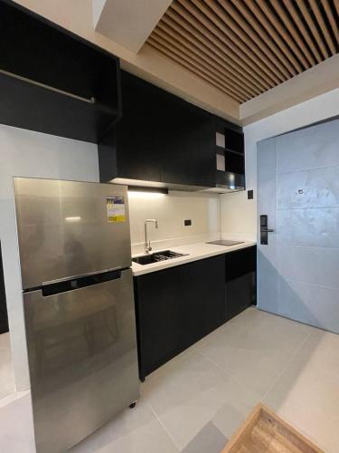 Η κουζίνα ή μικρή κουζίνα στο AIR Condo