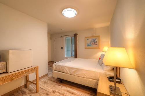 Katil atau katil-katil dalam bilik di Newport Inn By OYO - Hwy 101