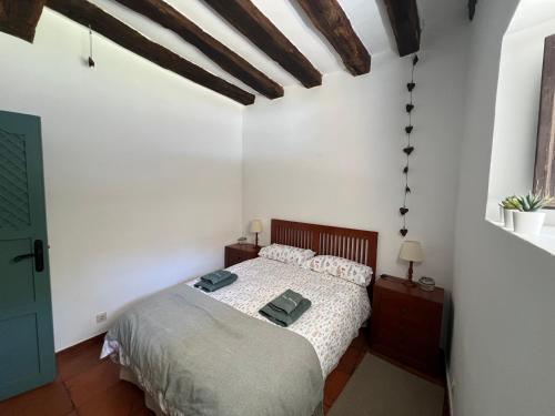 Postel nebo postele na pokoji v ubytování La Casuca