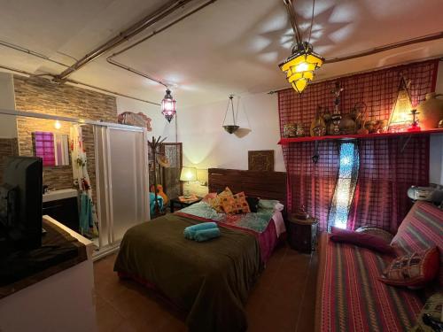 Postel nebo postele na pokoji v ubytování La Casa del Pianista