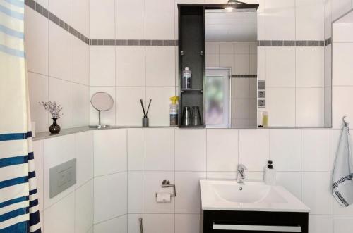 Ένα μπάνιο στο Ferienwohnung Kupfer