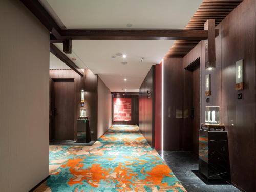 Gallery image of Zhengzhou East Station Longzi Lake University Area Qianna Yuanxi Hotel in Zhengzhou