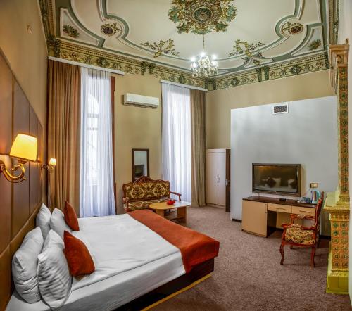 Postel nebo postele na pokoji v ubytování Garden Inn by NHG