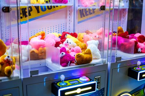 a bunch of stuffed animals in a machine at Kumar Resort By Turtle, Lonavala in Lonavala