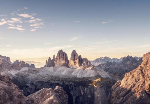 a view of a mountain range with rocks at Ferien & Wellnesshotel Windschar in Brunico