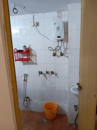 a bathroom with a shower and a sink at Geeta Villa in Lucknow