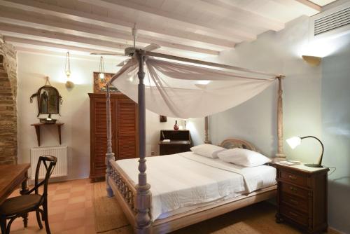 Ένα ή περισσότερα κρεβάτια σε δωμάτιο στο Tinos Grand Villa 6BR 15ppl Infinite Views