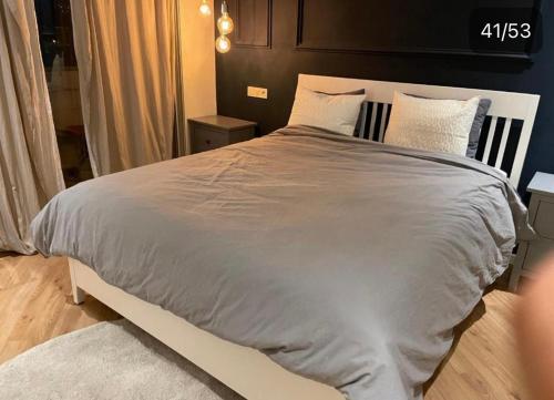 Postel nebo postele na pokoji v ubytování Chic apartment islan