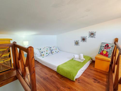 Ένα ή περισσότερα κρεβάτια σε δωμάτιο στο Abades Beach Home