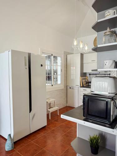 Η κουζίνα ή μικρή κουζίνα στο Abades Beach Home