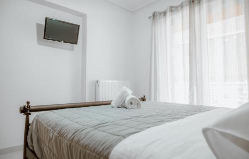 Postel nebo postele na pokoji v ubytování Efthimia Αpartment