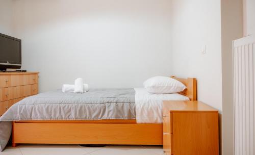 Postel nebo postele na pokoji v ubytování Efthimia Αpartment