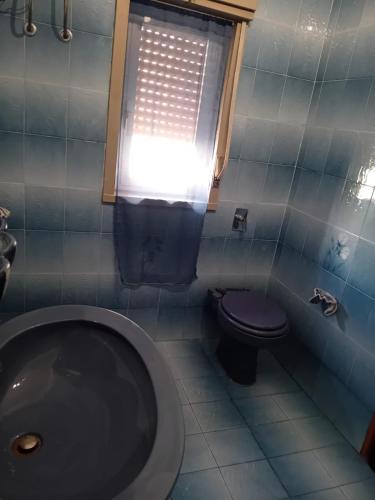 Koupelna v ubytování Il Corbezzolo Appartamenti