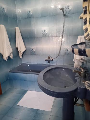 Koupelna v ubytování Il Corbezzolo Appartamenti