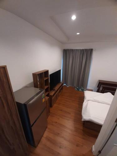 Postel nebo postele na pokoji v ubytování Baan Duang Khae Beach House