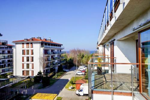 a view from the balcony of an apartment building at Baltic Park Plaza by Baltic Home in Świnoujście