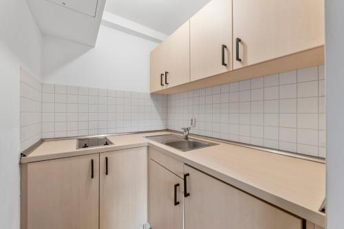 Kuchyň nebo kuchyňský kout v ubytování Hotel Friedrichstadt