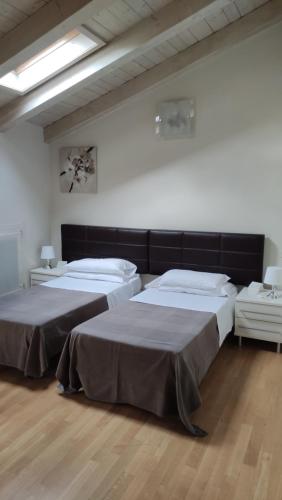 Ένα ή περισσότερα κρεβάτια σε δωμάτιο στο Residence La Mason