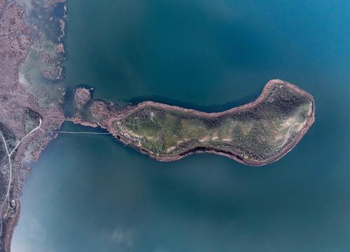 an aerial view of a island in the water at Prespes Lake View Family Apartment in Florina