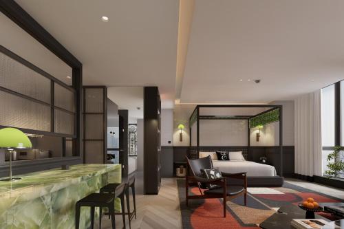 a hotel room with a bed and a desk at 重庆Indition英迪逊酒店江北嘴金融城店 in Chongqing