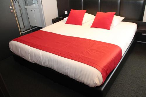 Hotel La Louve tesisinde bir odada yatak veya yataklar
