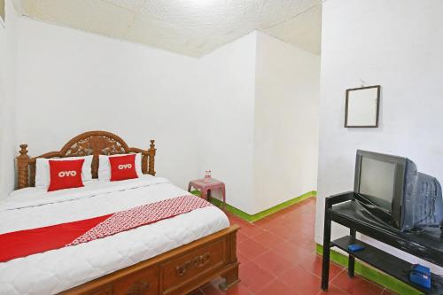 TV a/nebo společenská místnost v ubytování Hotel O Arimbi