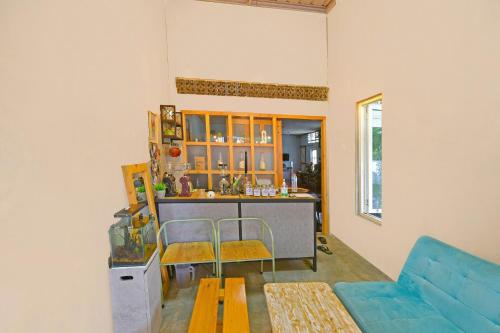 Posezení v ubytování Hotel O Arimbi