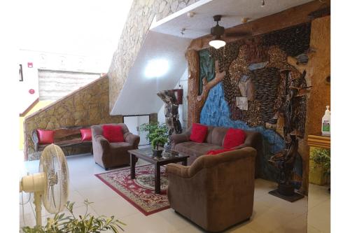 Gallery image of OYO 880 Flores De Musa Inn in Puerto Princesa City