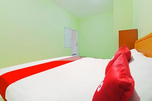 Galeriebild der Unterkunft OYO 91351 87 Guest House in Balian