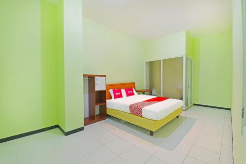 Galeriebild der Unterkunft OYO 91351 87 Guest House in Balian
