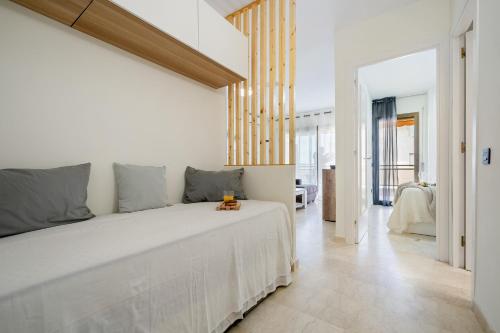 Кровать или кровати в номере Aquamarina Apartments