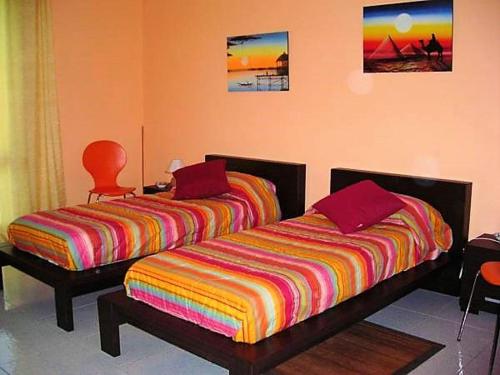 Posteľ alebo postele v izbe v ubytovaní B&B CasAnsaldo