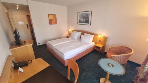 Postel nebo postele na pokoji v ubytování Hotel Panorama Hamburg-Billstedt