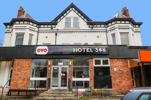 a building with a hotel sign on the front of it at Hotel 346 in Manchester