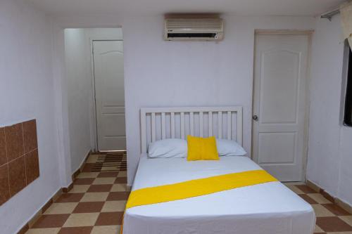 Postel nebo postele na pokoji v ubytování OYO Hotel Marías,Aeropuerto Internacional de Chetumal