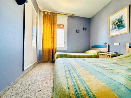 Postel nebo postele na pokoji v ubytování Global Immo 3170 Hort De Mar E