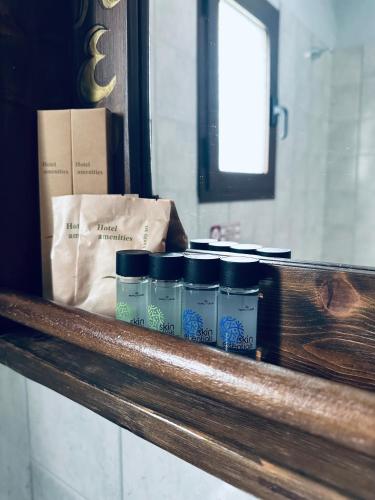 a shelf with a bunch of products on it at Panthoron Tzoumerka in Vourgareli