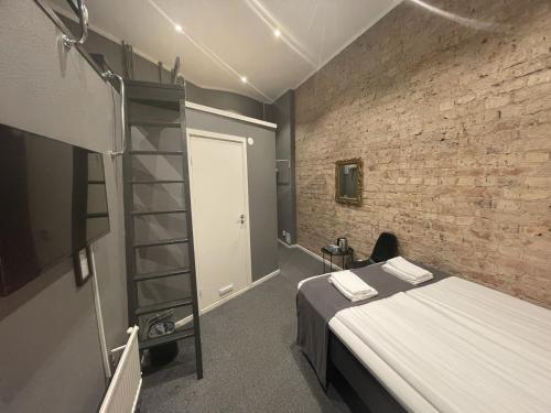 Кровать или кровати в номере Unique Hotel