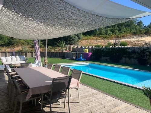Photo de la galerie de l'établissement Villa 12 personnes piscine chauffée et jacuzzi, à Capbreton